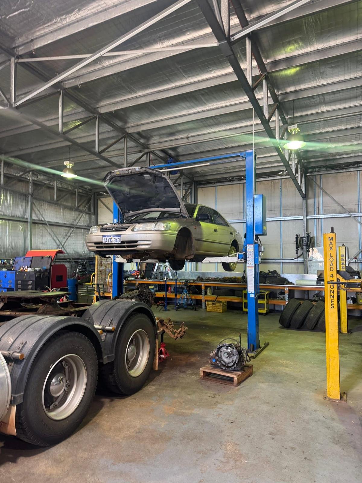 Vehicle on hoist at Harris's Garage workshop