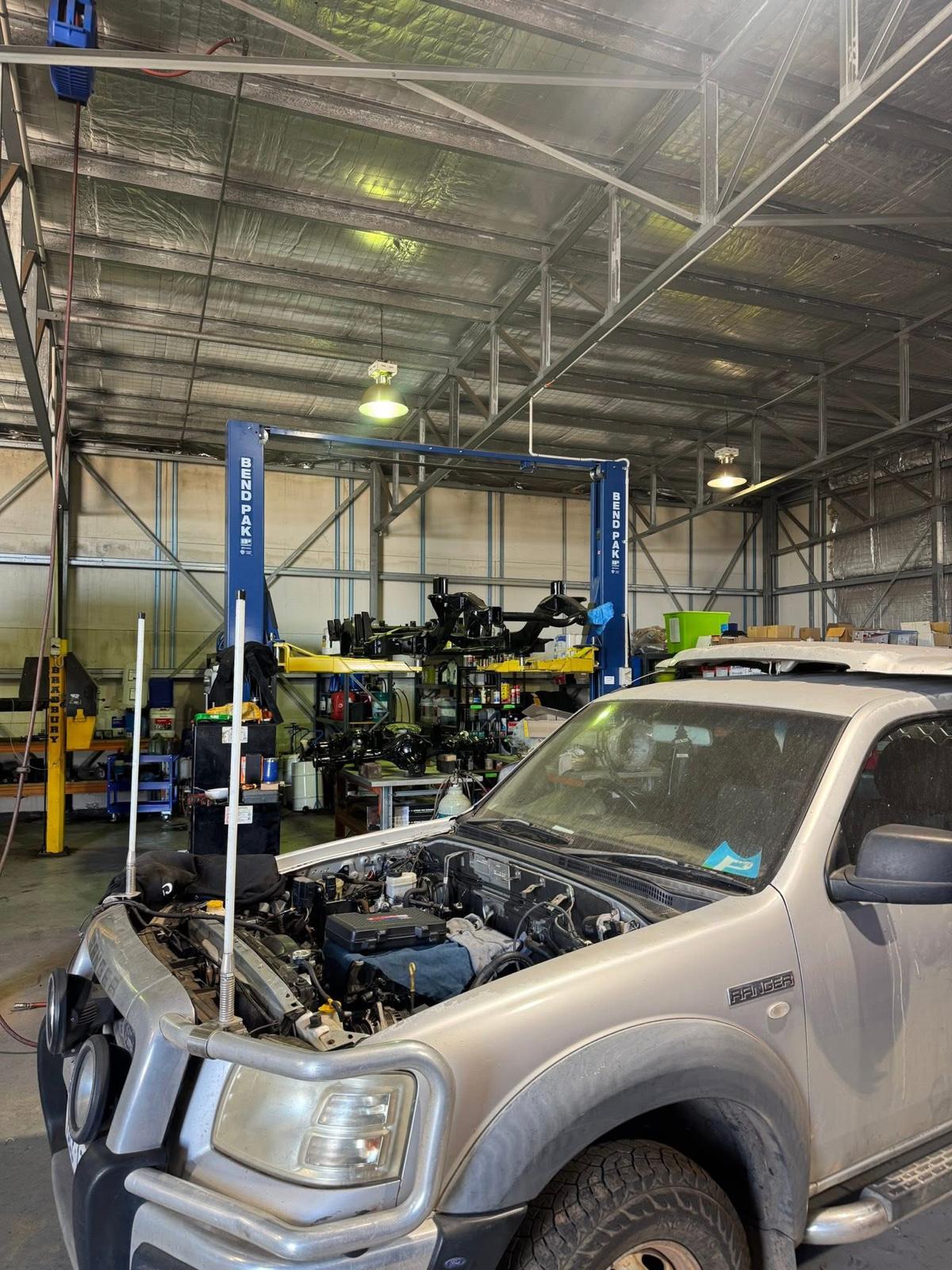 Mechanic working on a car in Kojonup