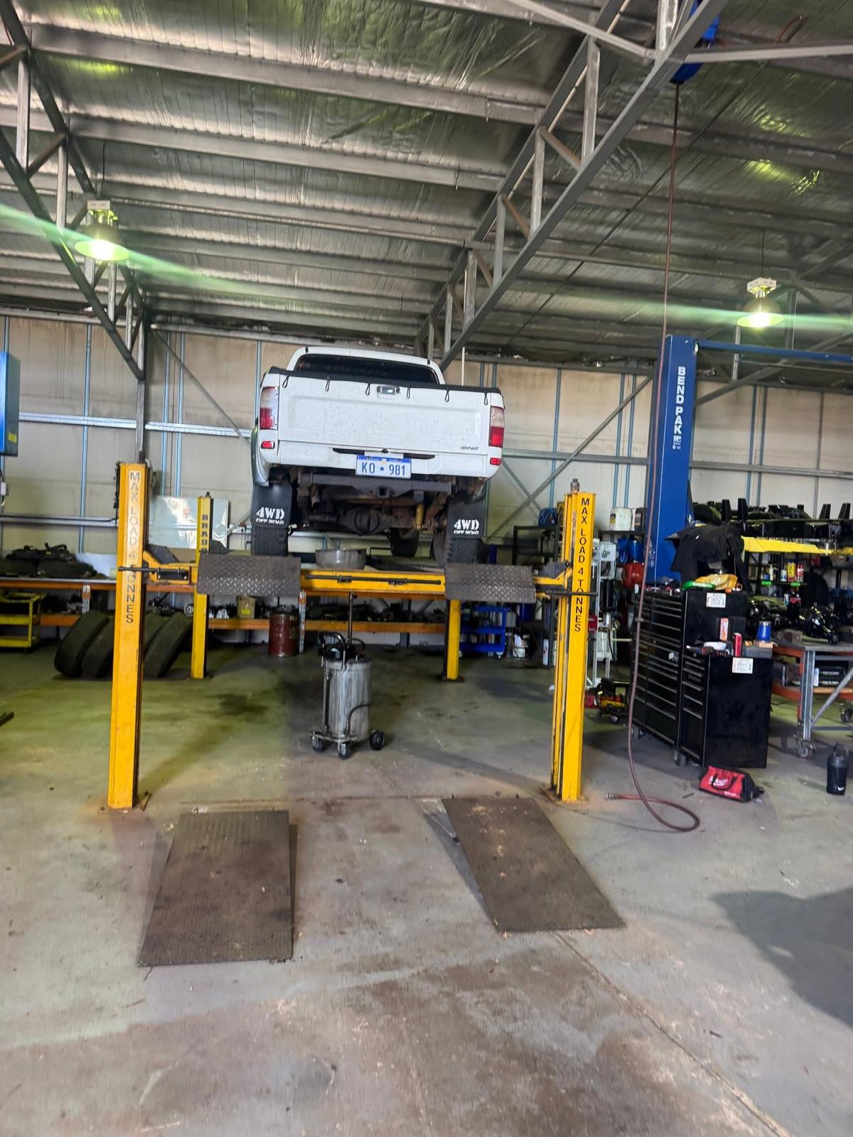 Harris's Garage signage and workshop
